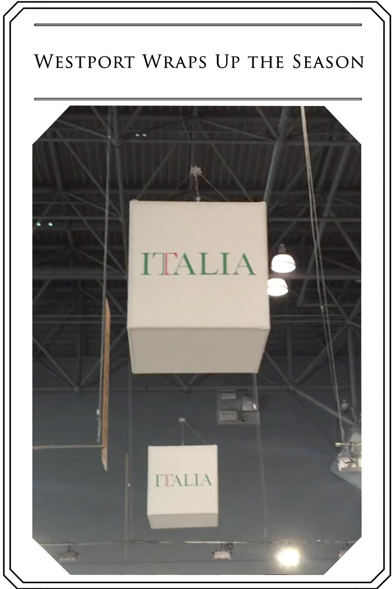 Image of merchandise show ceiling with brand name "Italia" hanging, with text above image that reads "Westport Wraps up the Season", Men's Big & Tall