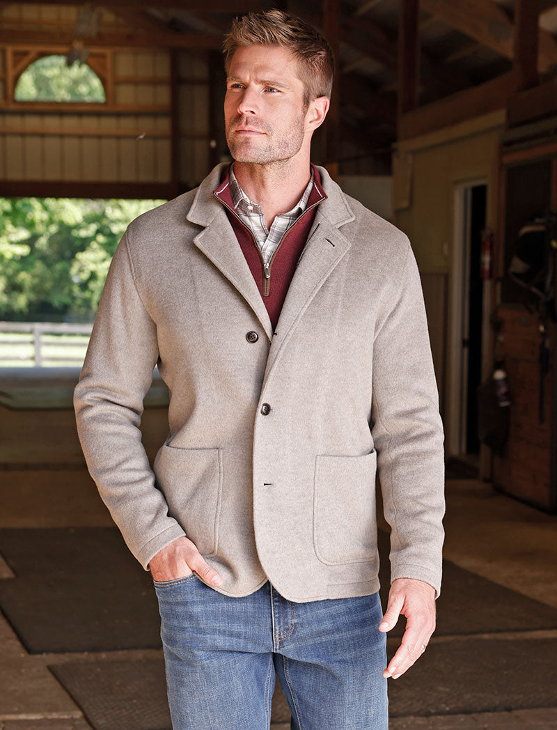 Male model wearing Peter Millar Crown Flex Merino Blazer