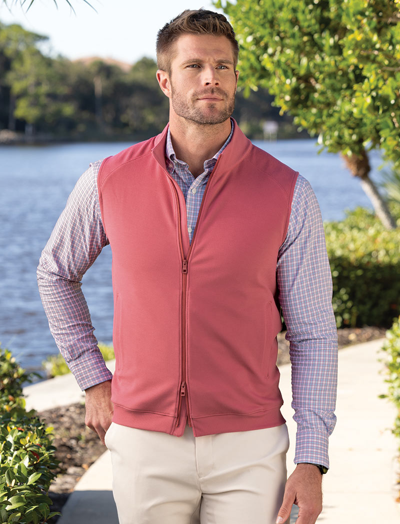 Male model wearing Peter Millar Cradle Pique Full Zip Vest