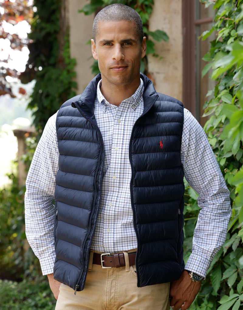 Male model wearing Polo Ralph Lauren Packable Vest