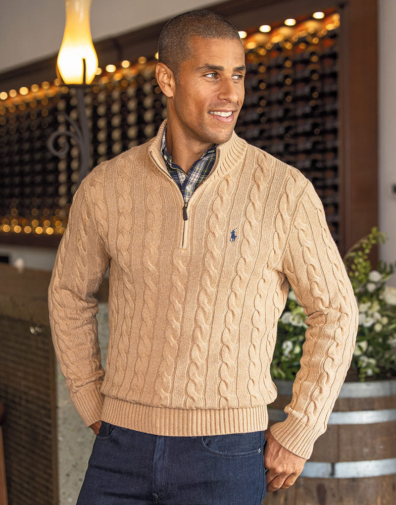 male model wearing a quarter-zip cable knit sweater