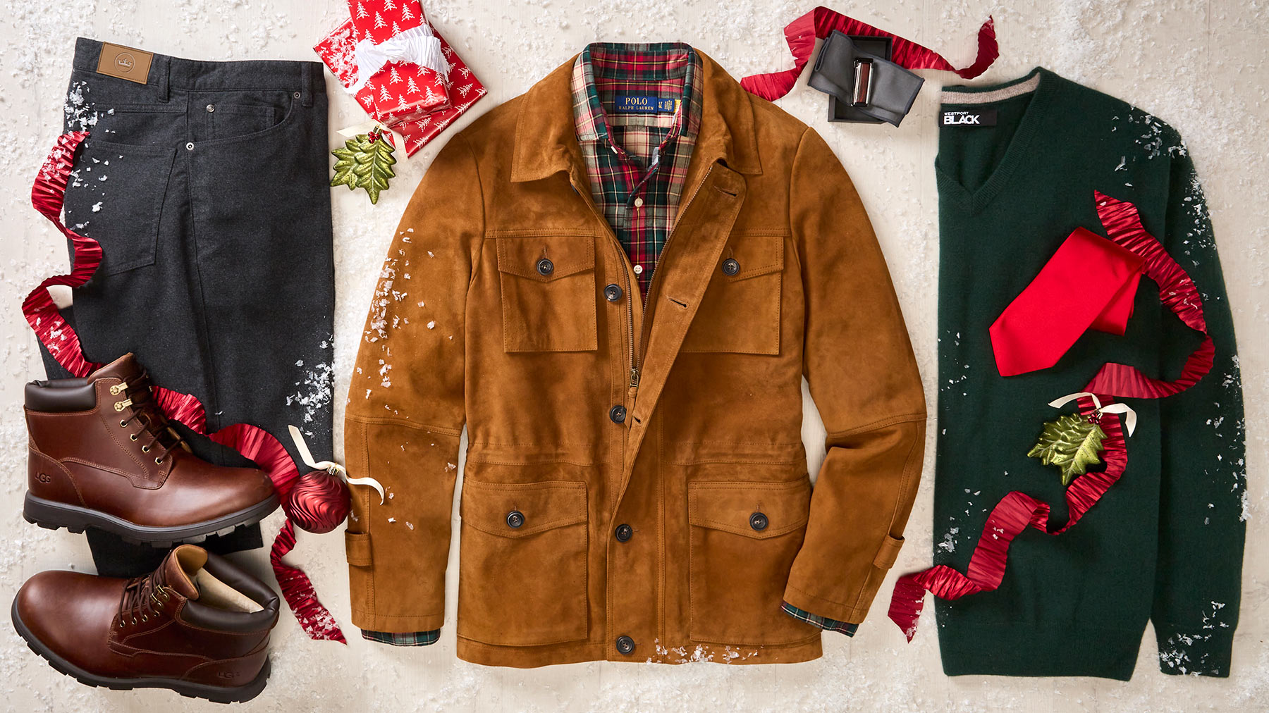 Assortment of holiday gifts such as boots, flannel pants, leather jacket, and sweater