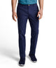 Navy performance pant worn on model, tapered leg and belt loops visible