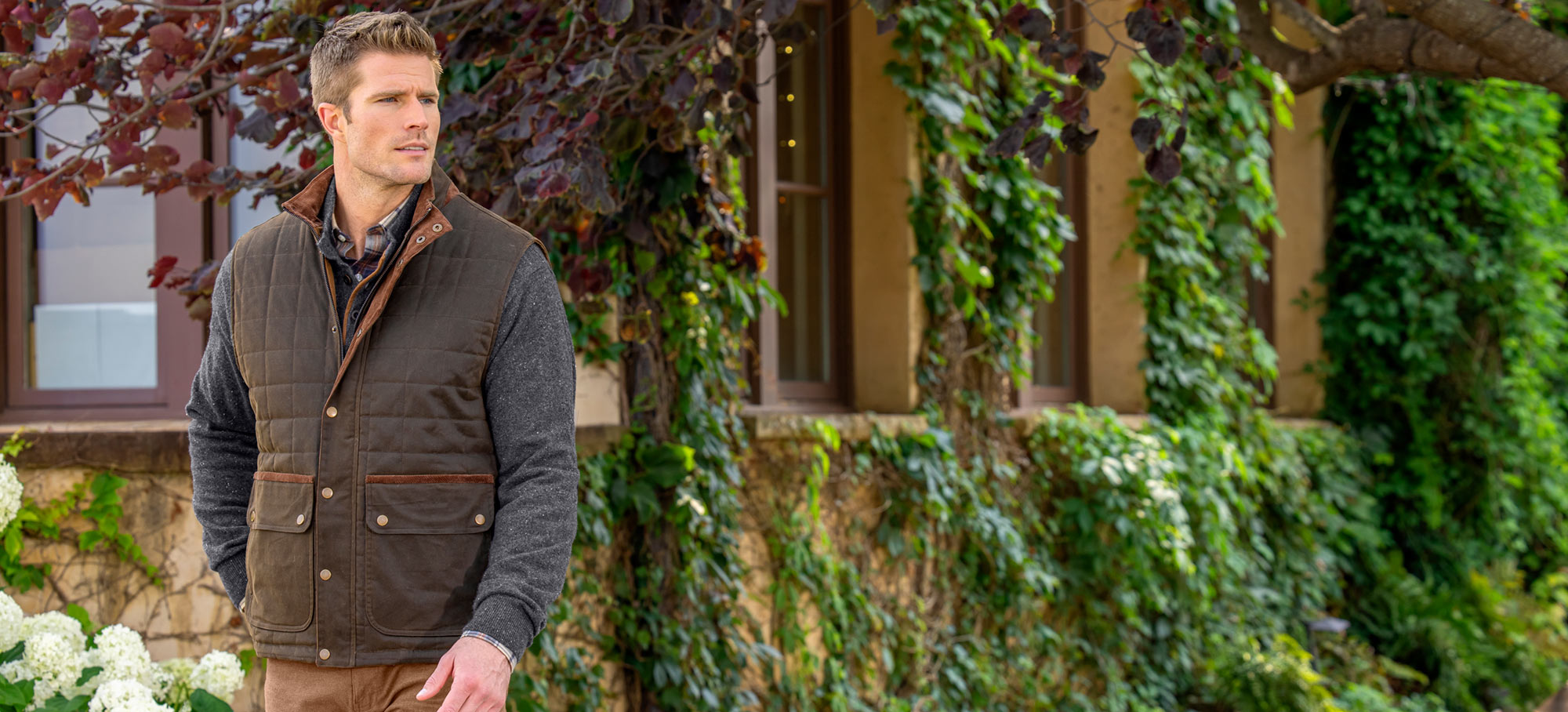 Male model wearing Westport Black Waxed Cotton Quilted Vest