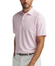 Pink geo-print mesh polo shirt on model with short sleeves and buttoned placket.