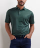 Green short-sleeve polo with patterned texture, three-button placket, and ribbed collar