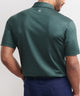 Back view of green patterned short-sleeve polo with collar and relaxed fit