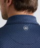 Navy patterned polo collar with round crest logo