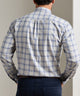 Men's back view performance flannel shirt, light grey with blue plaid, long sleeves.