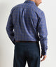 Men's back view performance flannel shirt, navy with blue plaid, long sleeves.