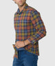 Side view of long-sleeve multicolor plaid shirt with spread collar and button cuffs