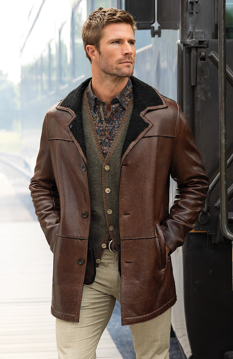 Male model wearing Westport Black Mid-Length Leather Jacket