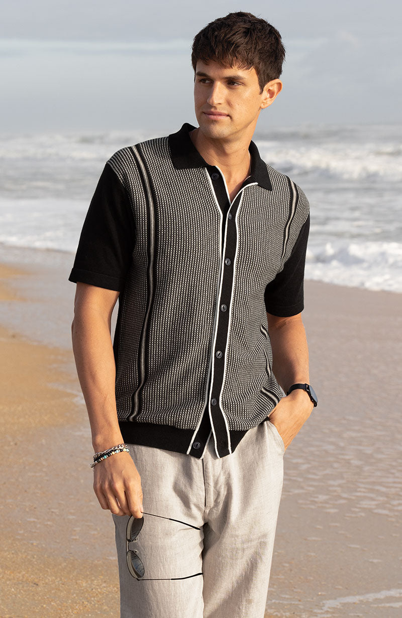 Male model wearing Westport Black Short Sleeve Como Button Front Polo