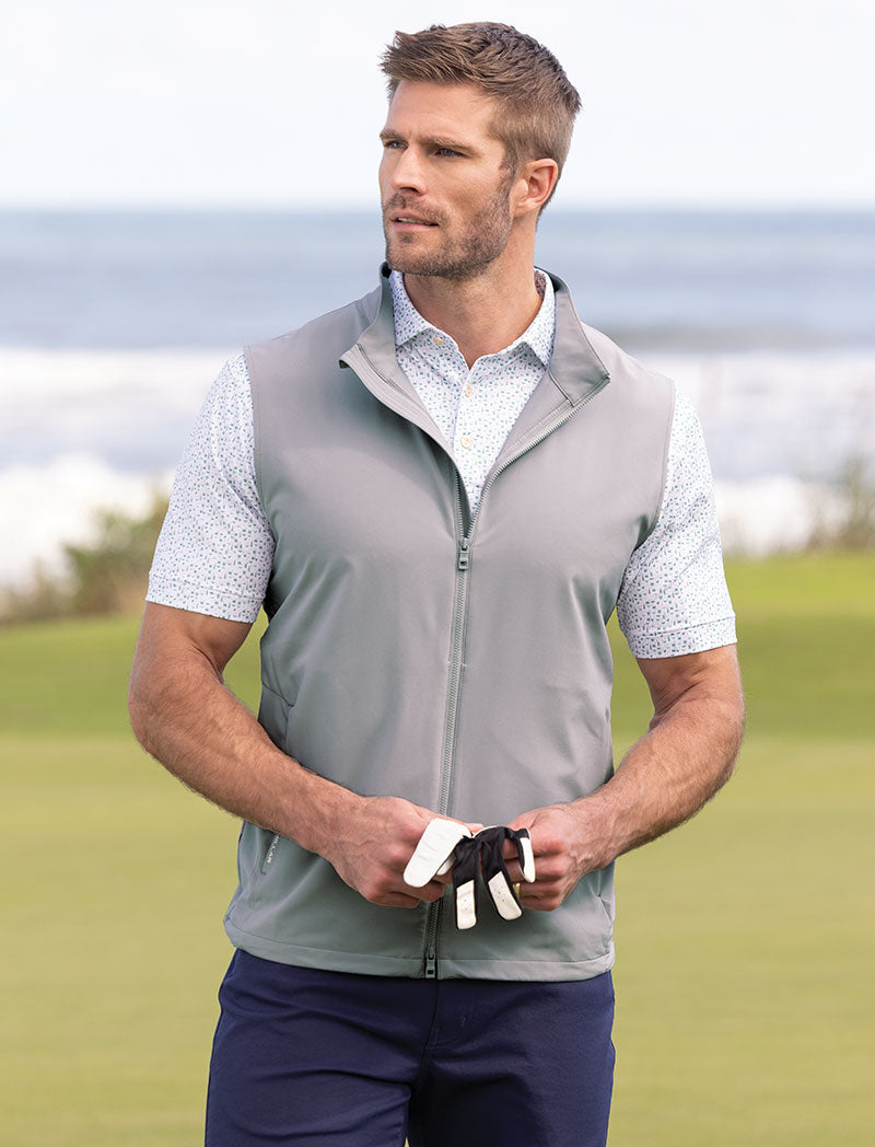 Male model wearing Peter Millar Full Zip Dunes Vest