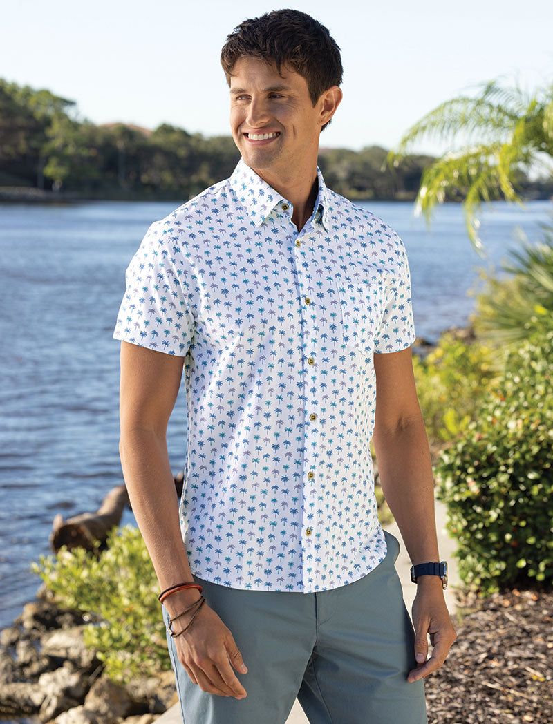 Male model wearing Westport Lifestyle Palm Print Performance Stretch Sport Shirt