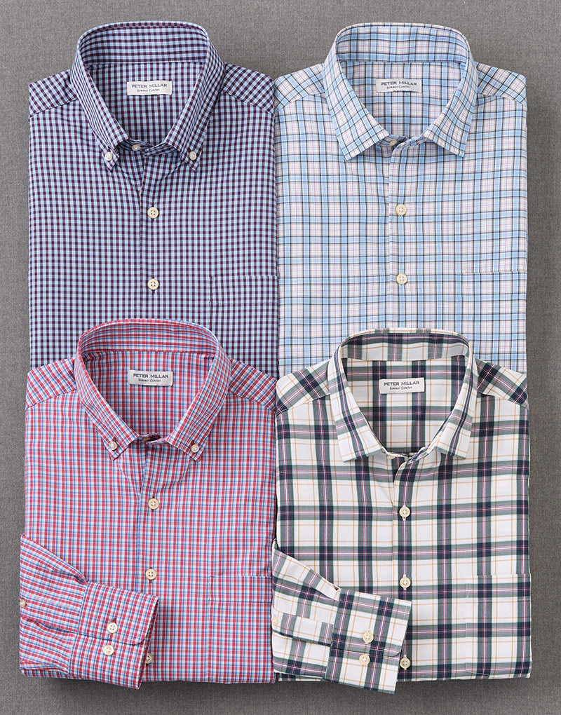 four sport shirts of varying plaid patterns